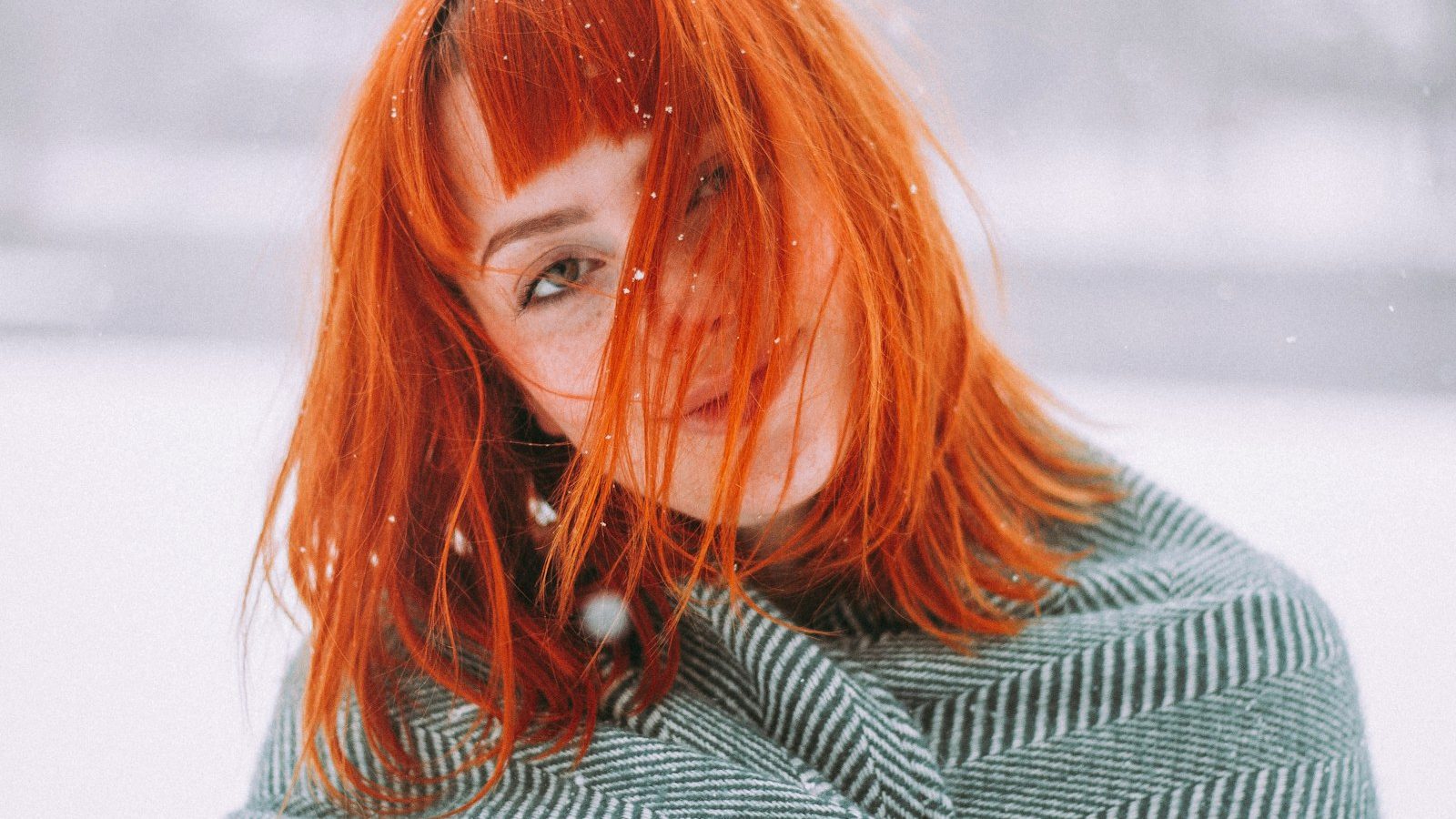 Hair color: woman with vibrant copper red hair