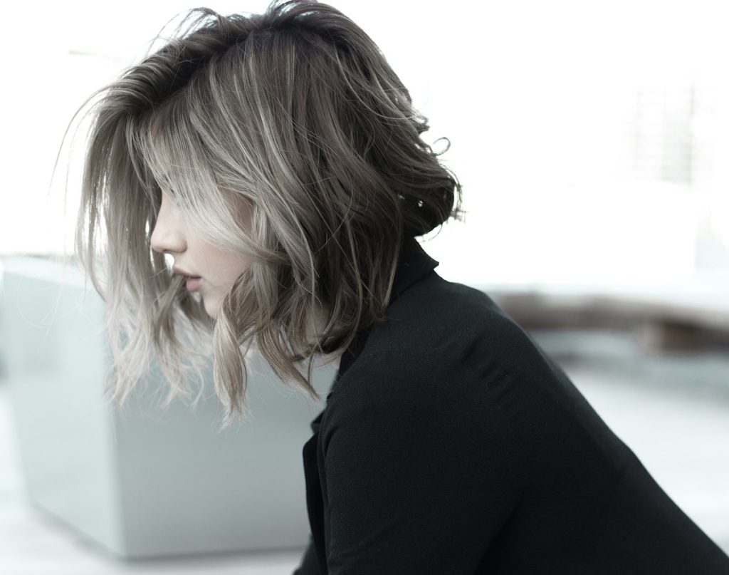 Hair cut salon near me within 400m: woman with a textured ash-blonde bob