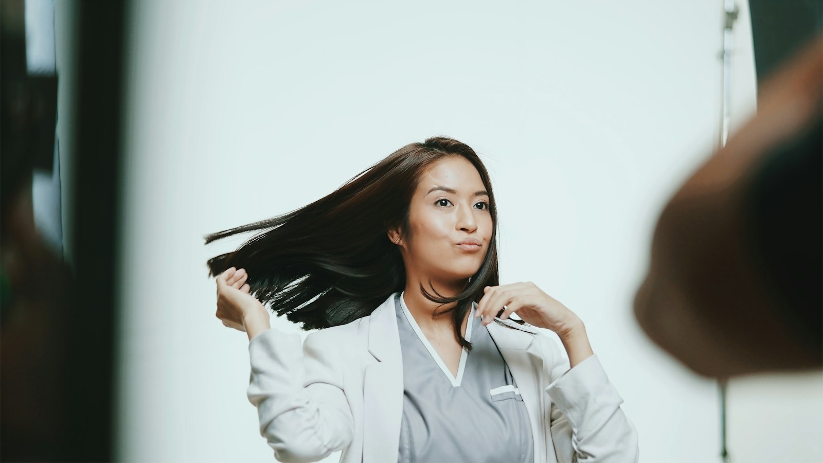 Top rated hair salon: woman with sleek, shiny dark hair