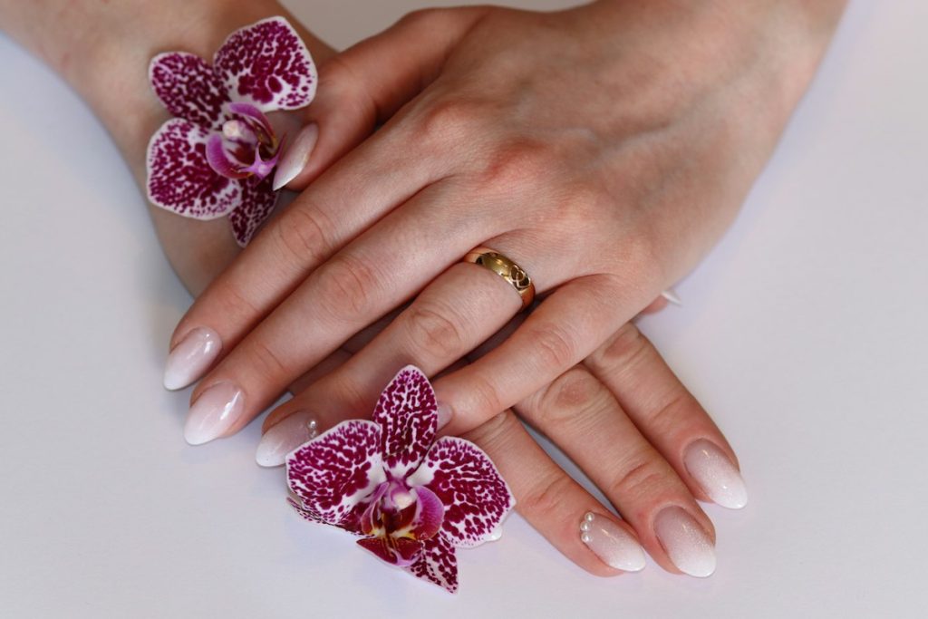 Nail design: french manicure with orchids