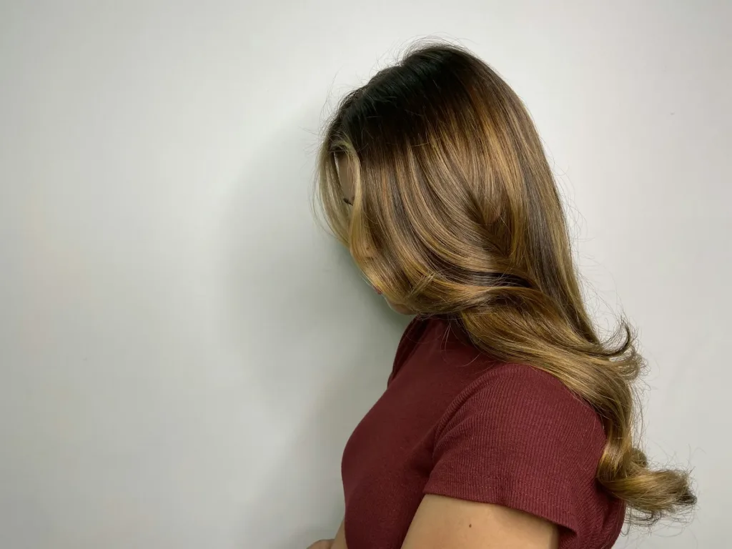 Hair glossing treatment at VOG Beauty Salon in Majan, Dubai